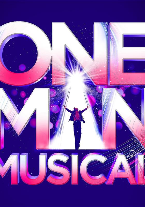 The words 'One Man Musical' in bold pink and white font. A suave suited man with his hands in the air is in a spotlight created by the A of the word 'man'. 