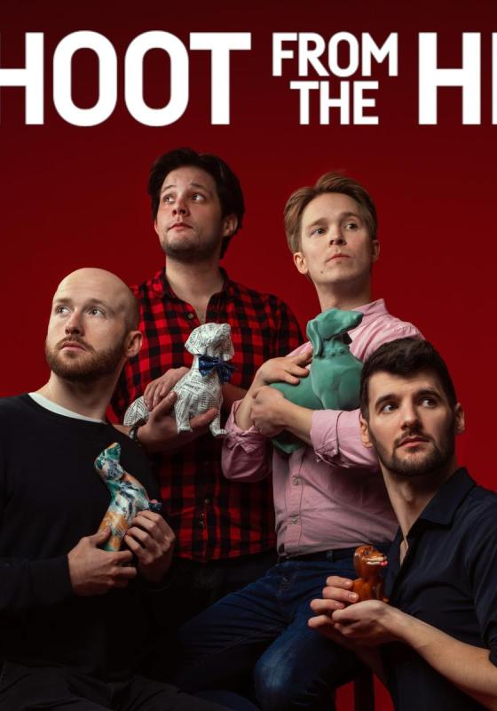 Shoot from the Hip troupe stand in a staged photograph set-up, each holding a porcelain dog.
