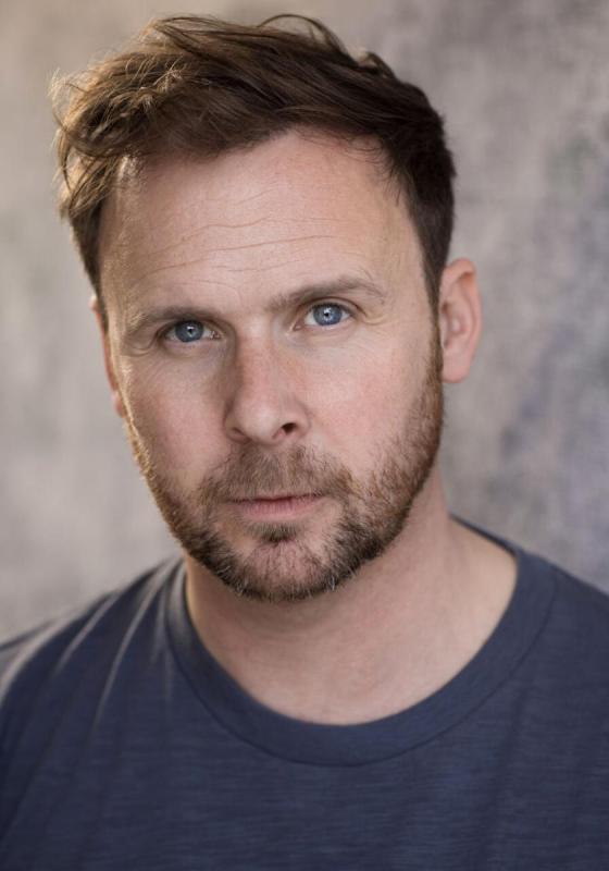 Headshot of Colin Hoult against a plain background