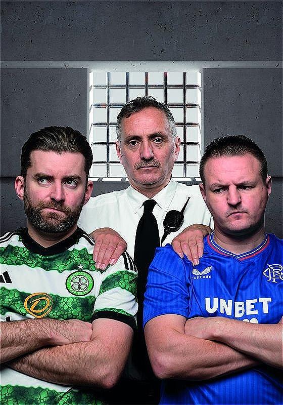 Two performers in football shirts with their arms crossed in front of a man in a white shirt and black tie.