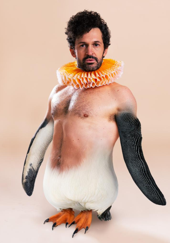 Garry as a half man/half penguin with a clown collar on.