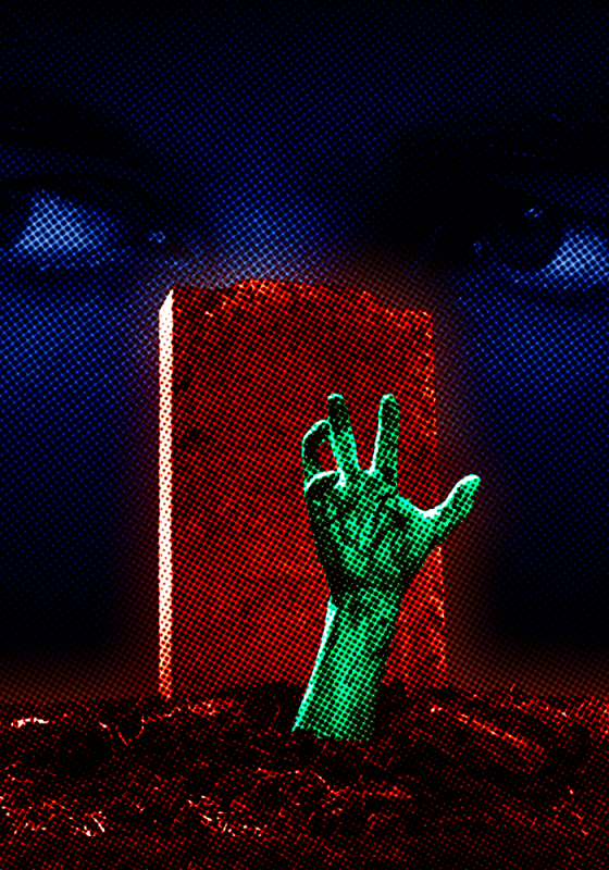 A hand coming out of a grave and eyes in the background