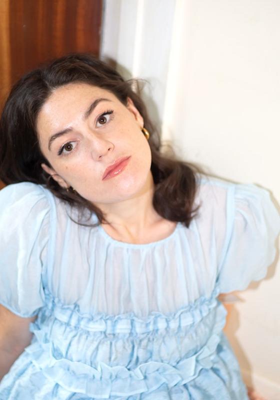 A person in a blue dress