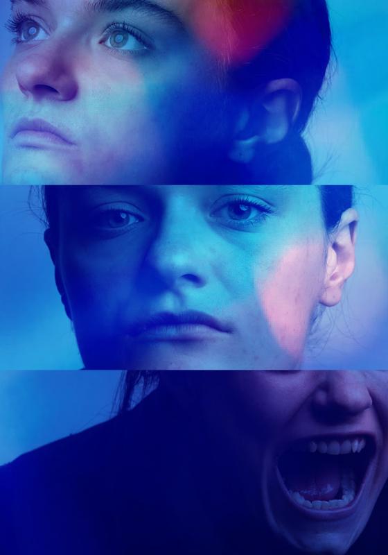 A woman's face split into three parts with a blue light flare filter applied.
