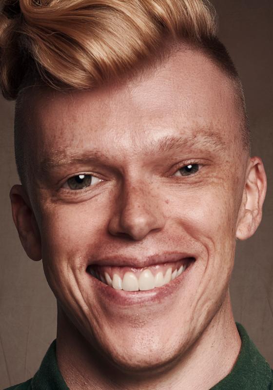 A heavily edited picture of the performer with a blonde quiff and a morphed face.