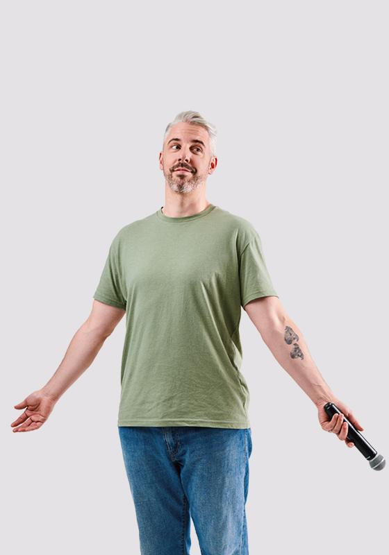 Picture of performer standing with open arms.