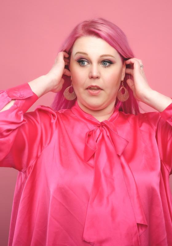 Lindsey all in pink on a pink background