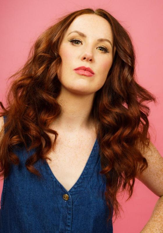 Headshot of Catherine Bohart wearing denim. 