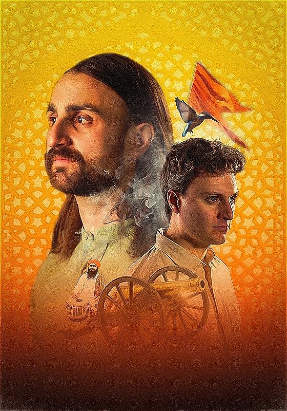 Niall and Jonathan stand against a yellow background, each looking in opposing directions. In between them is a cannon, with a person wearing a turban beside it, holding a drum. 