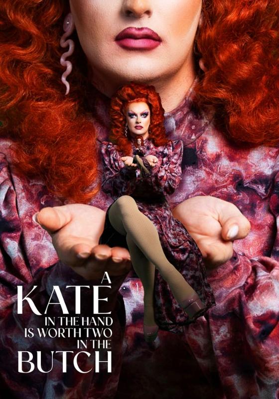 Kate Butch, wearing a red patterned dress and snake earrings, is cupping her hands in front of her and holding a smaller version of herself. The title of the show, 'A Kate in The Hand is Worth Two in the Butch' is at the bottom right of the image