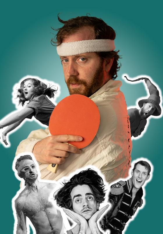 Don, holding a ping pong paddle, stands side on and looks over his shoulder towards the camera. 