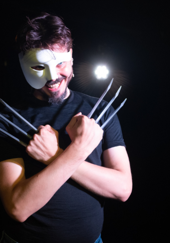 Joz wearing the iconic phantom of the opera mask and the Wolverine claws