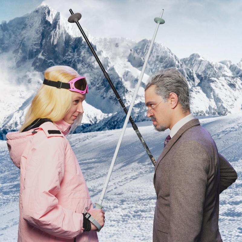 Gwyneth and Terry crossing ski poles
