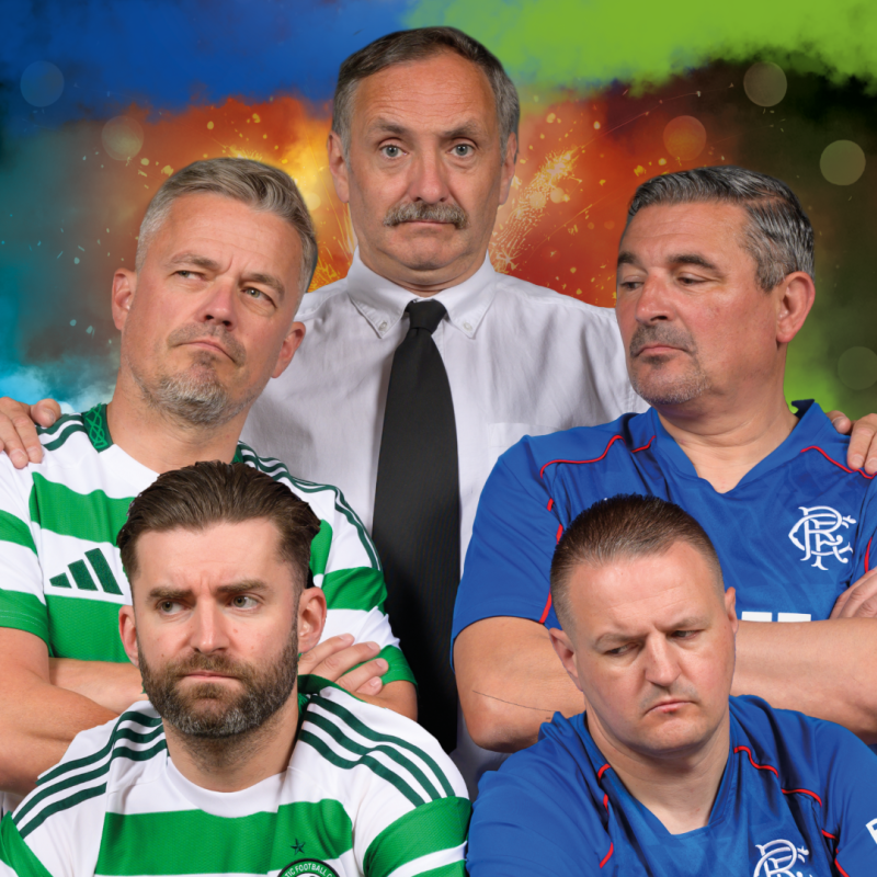 A group of five men standing together. Two are in green kits, two are in blue kits and the other is in a white shirt.