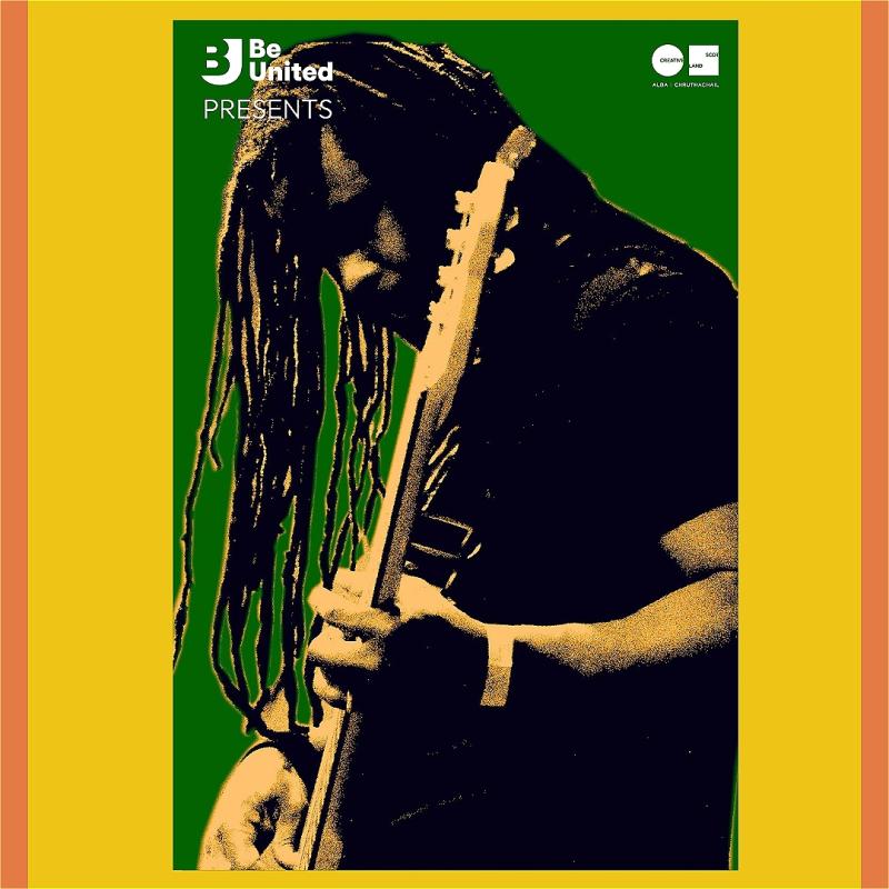 Photo of a musician playing guitar surrounded by green, yellow and orange Caribbean colours.