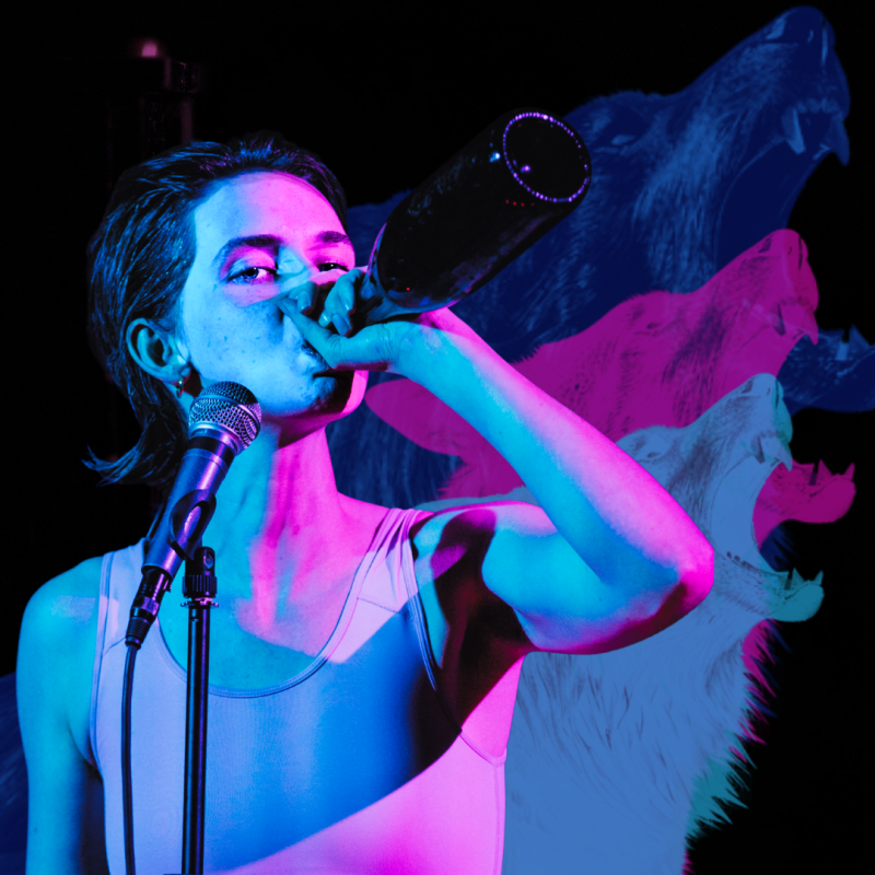 An actor takes a swig from a bottle in front of a microphone. Wolves howling in the background with blue and pink lighting.