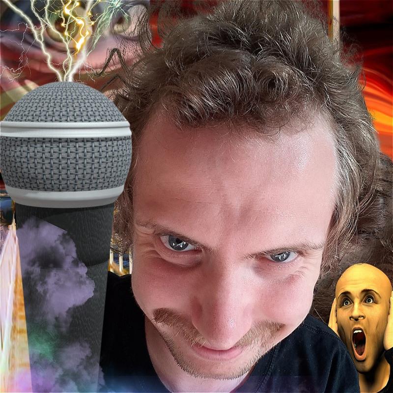 Mikey leers at the camera with a large microphone