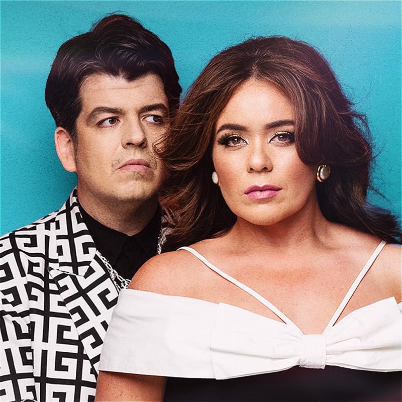 Photo of Laura and Joseph smiling against a blue background.