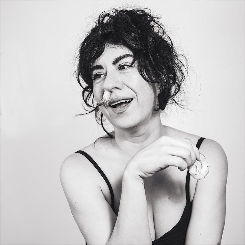 Black and white headshot of the performer.