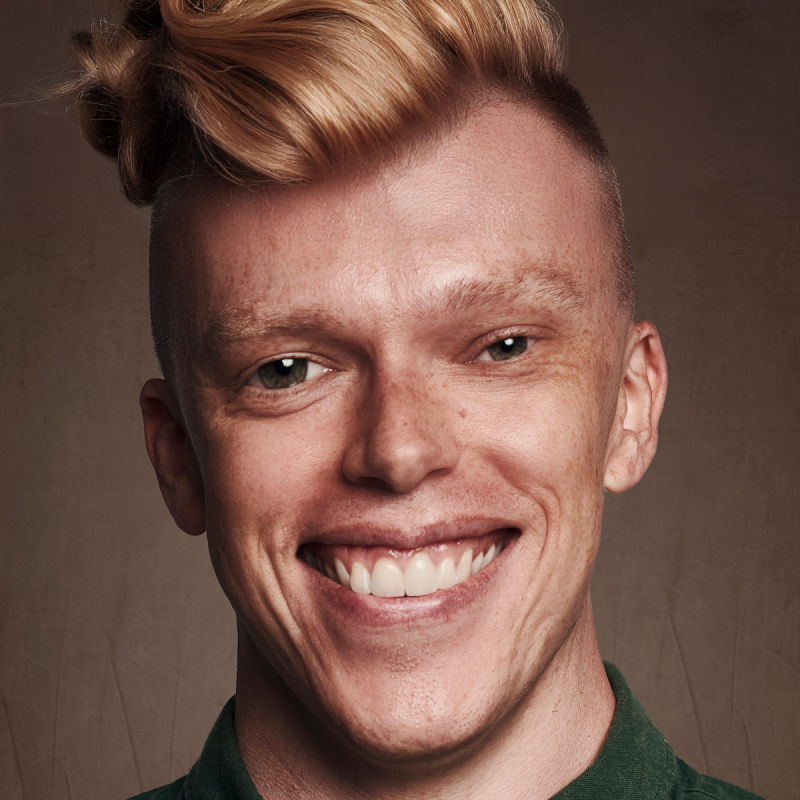 A heavily edited picture of the performer with a blonde quiff and a morphed face.
