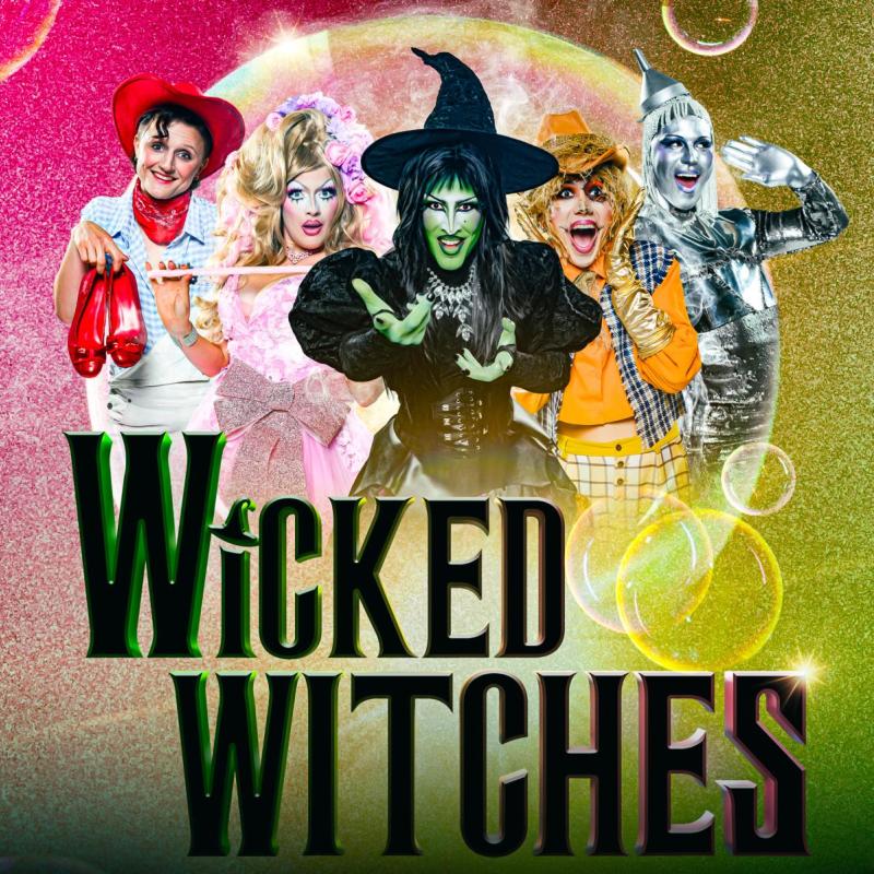 The cast of Wicked Witches stand above the title on top of a pink and green background.
