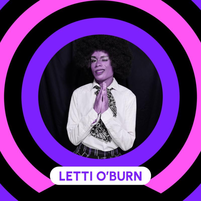 Poster showcasing a photo of Letti O'Burn. A black woman (drag queen) with black afro hair, a white shirt and a scarf. Her hands are in praying position.