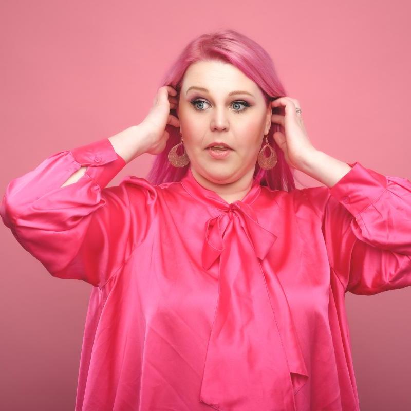 Lindsey all in pink on a pink background