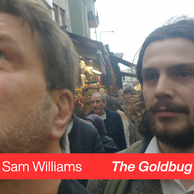 Photo of Sam Williams in a crowd scene with the show title underneath.