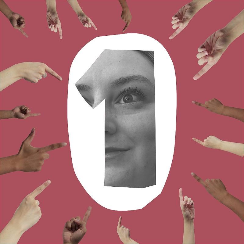 A smiling person partially covered by a cut-out of the number 1, various hands point at it before a pink background.