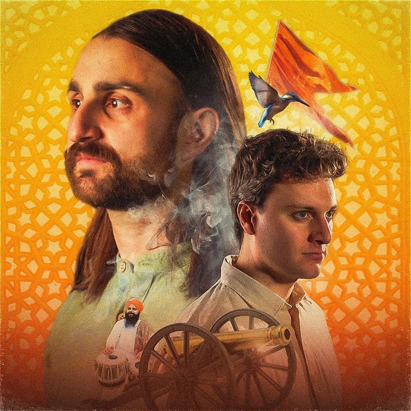 Niall and Jonathan stand against a yellow background, each looking in opposing directions. In between them is a cannon, with a person wearing a turban beside it, holding a drum. 