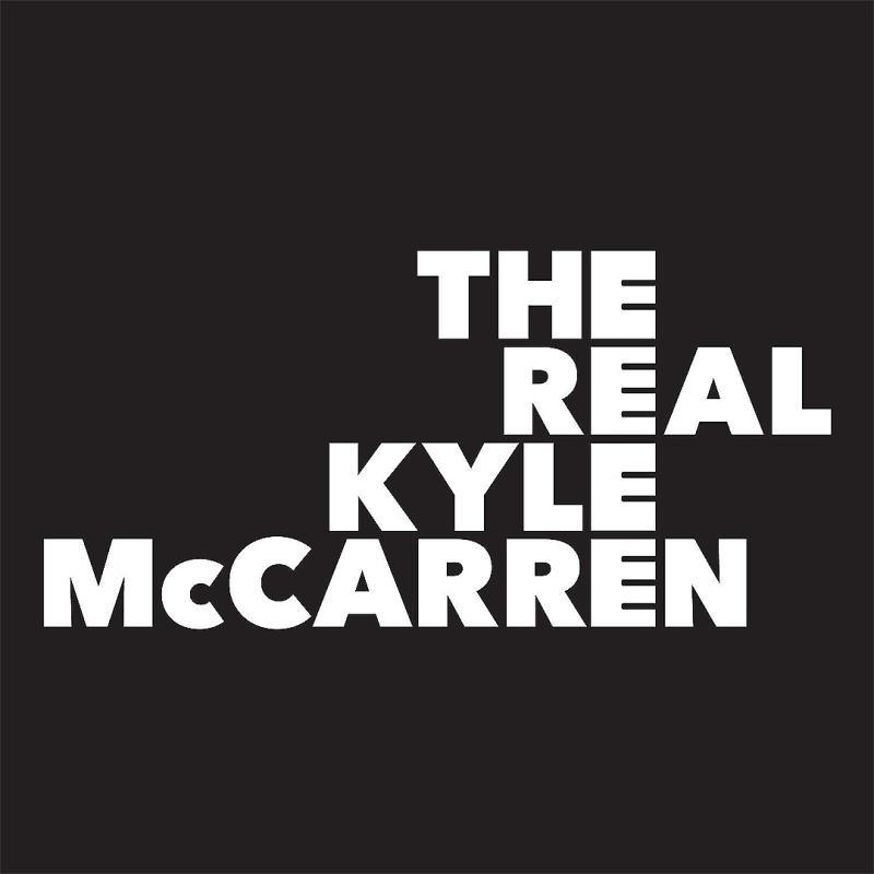 "THE REAL KYLE MCCARREN" is written in bold white letters over a black background. The letters E in each word are aligned so that the four E's together look like piano keys.
