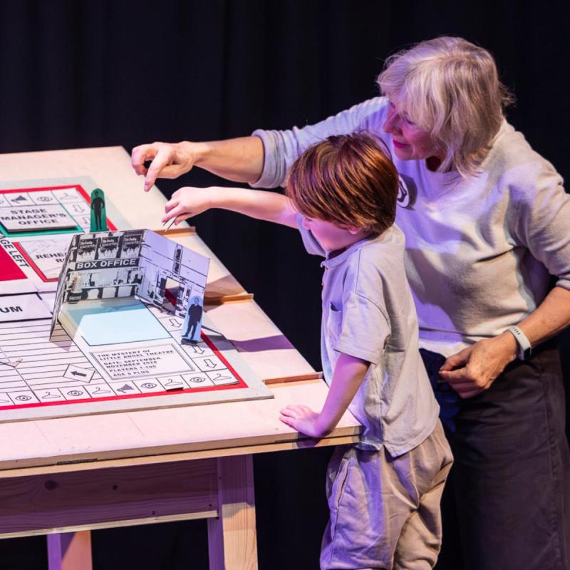 Danyah Miller and audience member in The Mystery of Pleasance Two. Photography: Ellie Kurttz