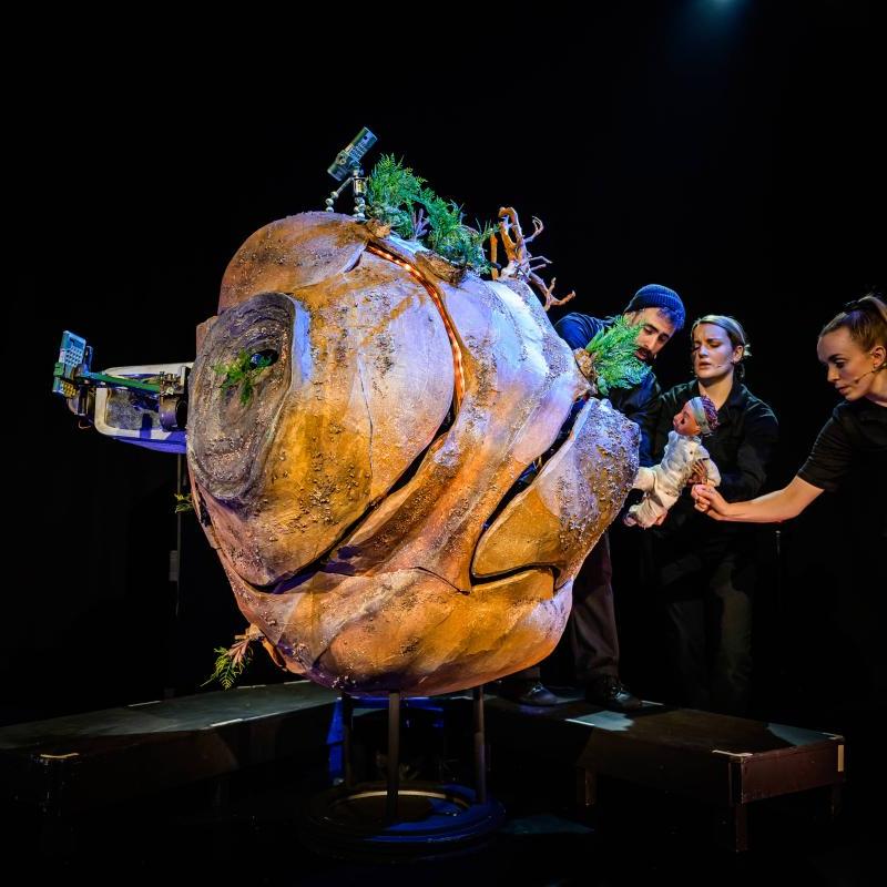 Tiny Planet with a puppet running around the edge. 