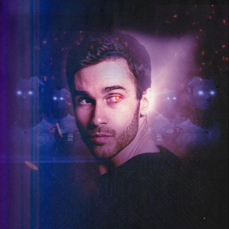 A man with dark hair and a beard looks back over his shoulder with one eye glowing red. In the background there are robotos with glowing white eyes