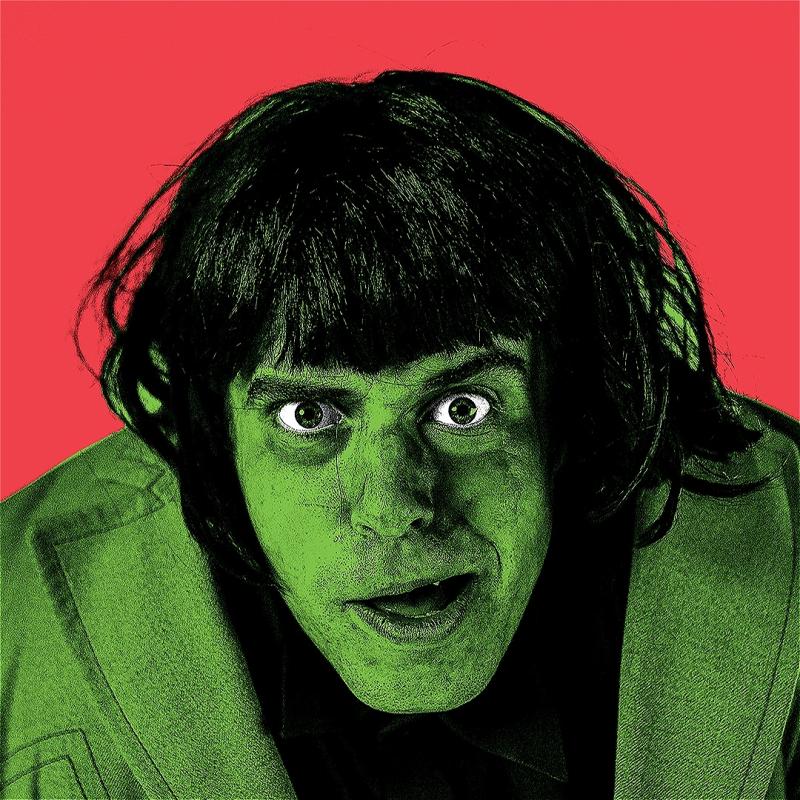 An individual with short black hair stares at the camera. Their skin and clothes are tinted green, highly contrasting with the vivid red background.