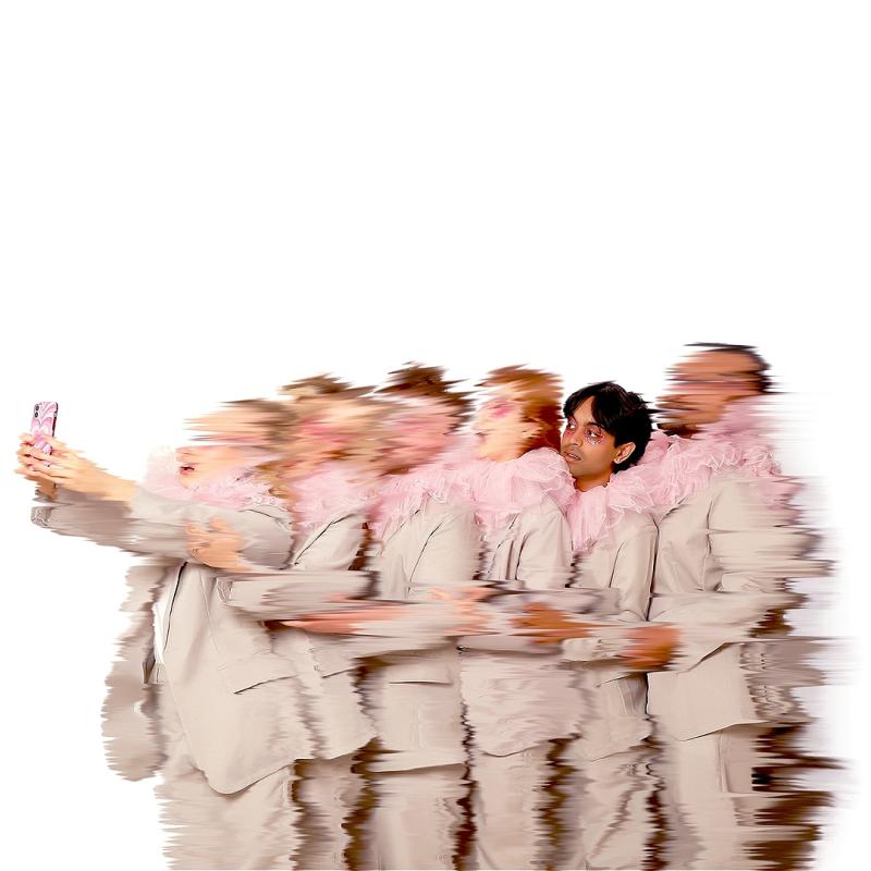 Blurry people with one in focus holding a phone