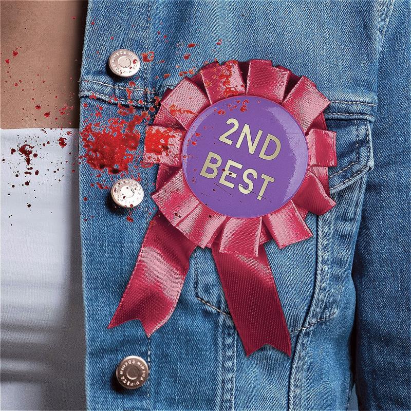 A jean jacket with a 2nd best rosette and a blood splatter. 