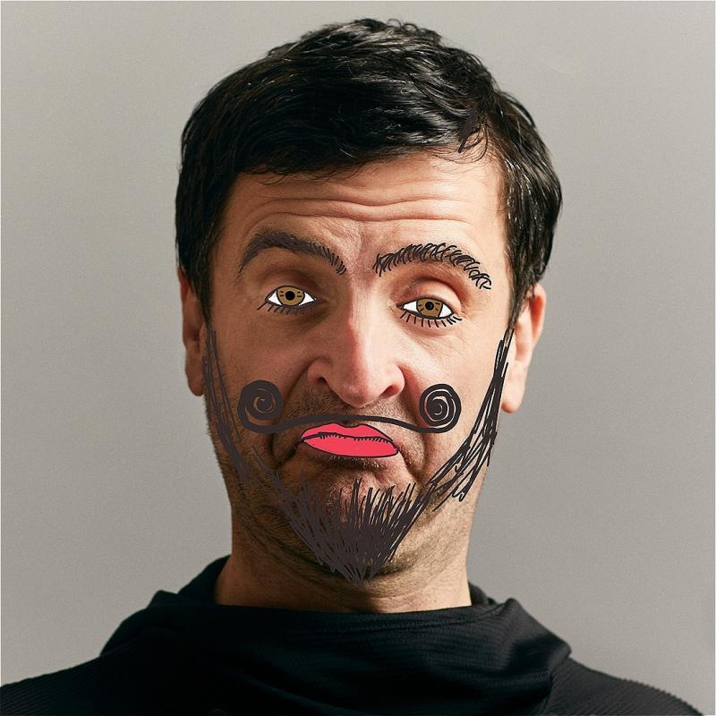A man looks at you, with cartoon squiggles on his eye, a moustache, lips and a beard. 