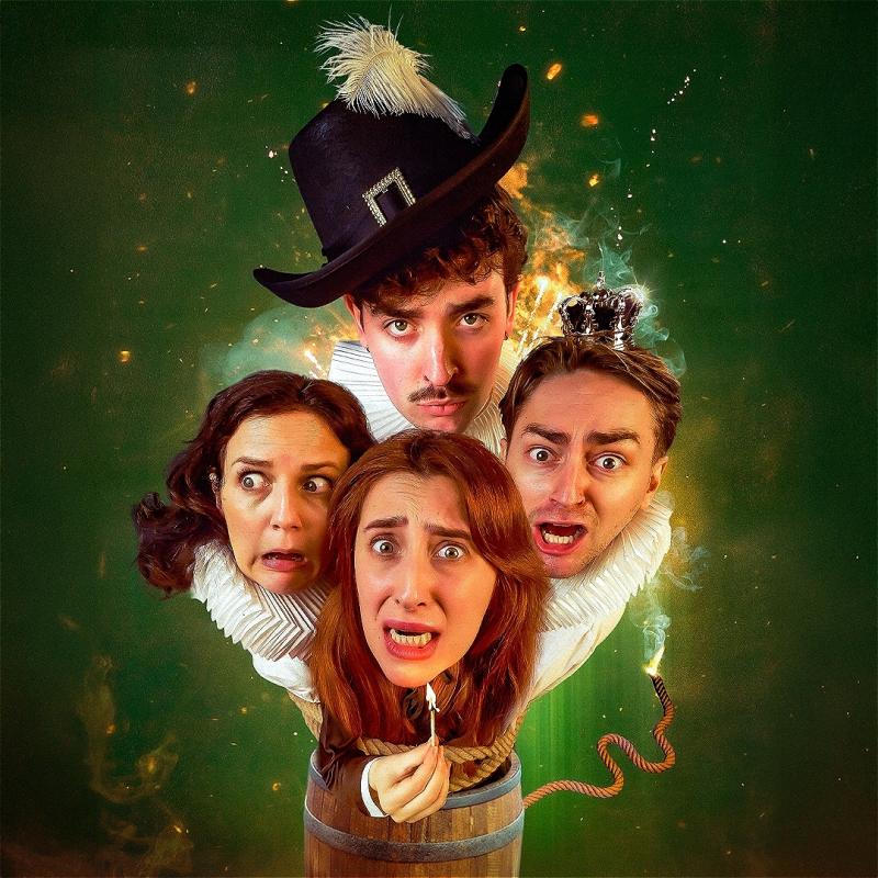Four performers' heads (two white men and two white women) are floating over a wooden barrel, wearing Guy Fawkes attire and different facial expressions of fear and surprise.