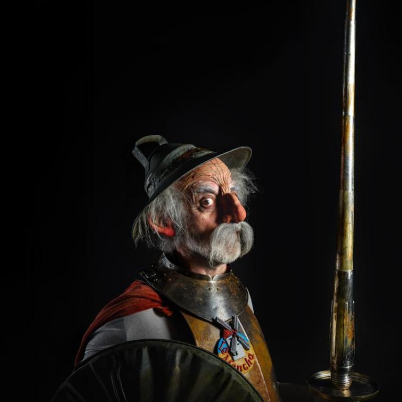 Don Quixote with a lance, and a dustbin lid for a shield