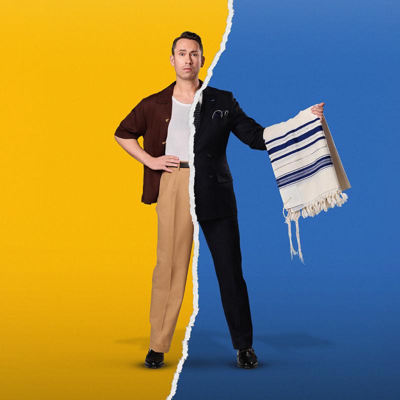 An image of Max is split down the middle. On the left you see half of Max, against a yellow background, wearing a brown button down shirt and beige slacks. On the right you see the other half of Max against a blue background, holding a white and blue throw. 