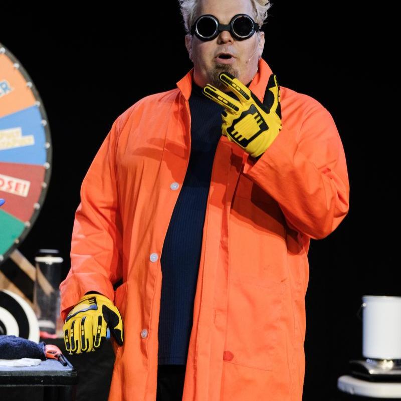 Image showing Doktor Kaboom with safety goggles and an orange lab coat