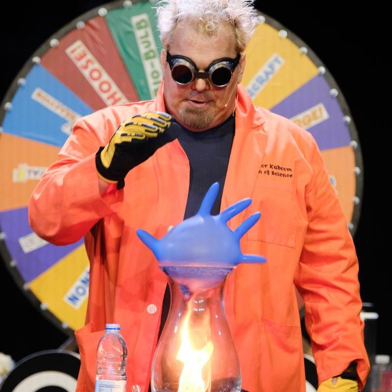 Image of Doktor Kaboom doing an experiment with fire