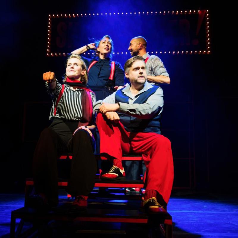 Image showing performers in a pretend car sitting on a bench