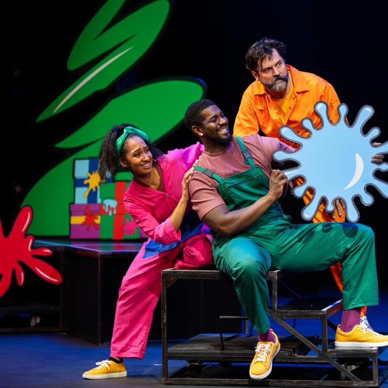Image showing three performers with cardboard cartoon cutouts