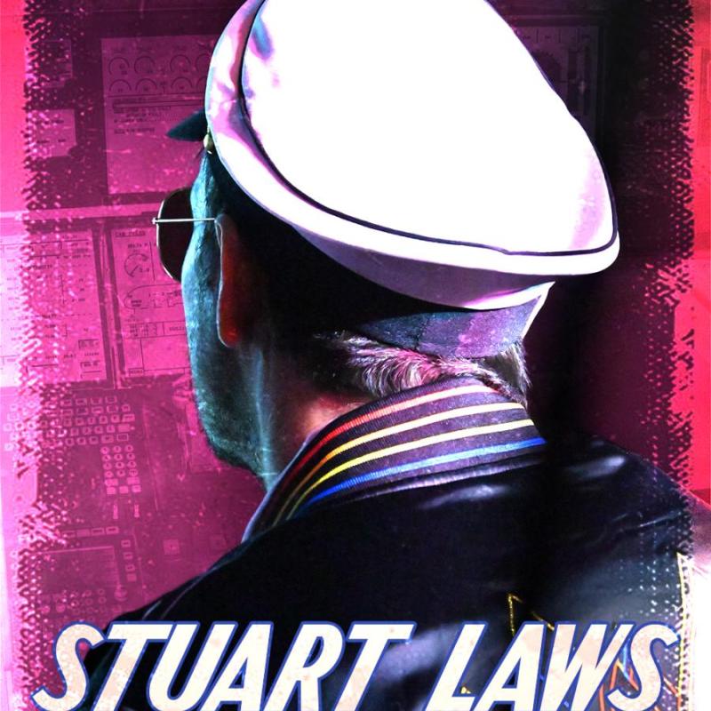 The back profile of a pilot with the text 'Stuart Laws Flies The Audience'.