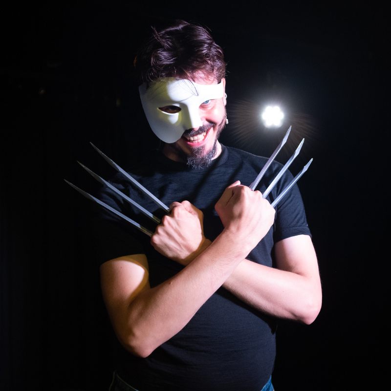 Joz wearing the iconic phantom of the opera mask and the Wolverine claws